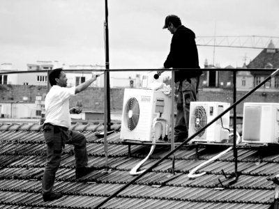 Workers on the Roof 02 photo