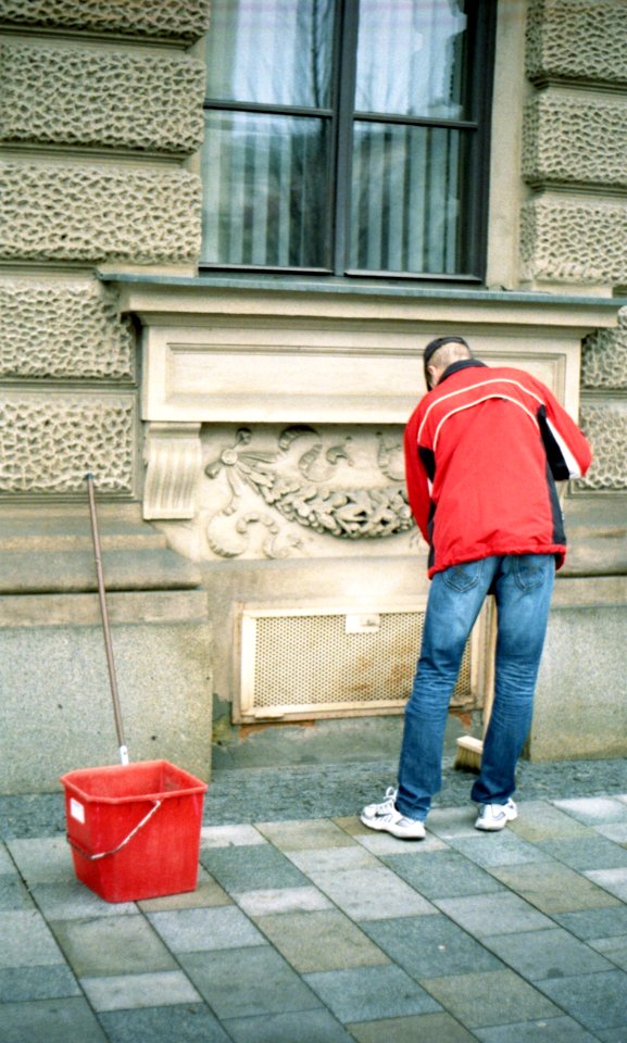 Praktica BC1 - Man Sweeping the Sidewalk