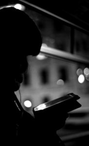Praktica BC1 - Girl Reading a Smartphone at Tram Window