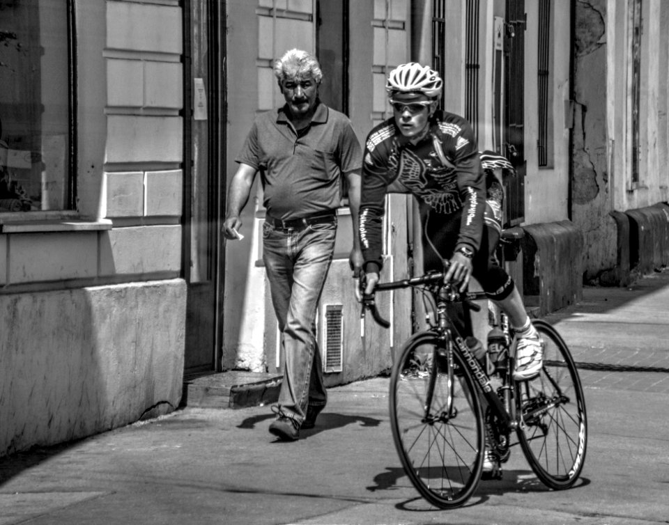 Cyclist on Cejl Street Sidewalk