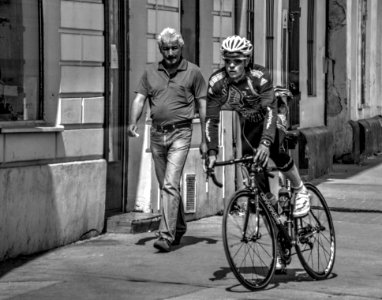 Cyclist on Cejl Street Sidewalk
