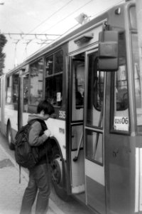 Young Woman Entreing a Bus (Smena 8M)