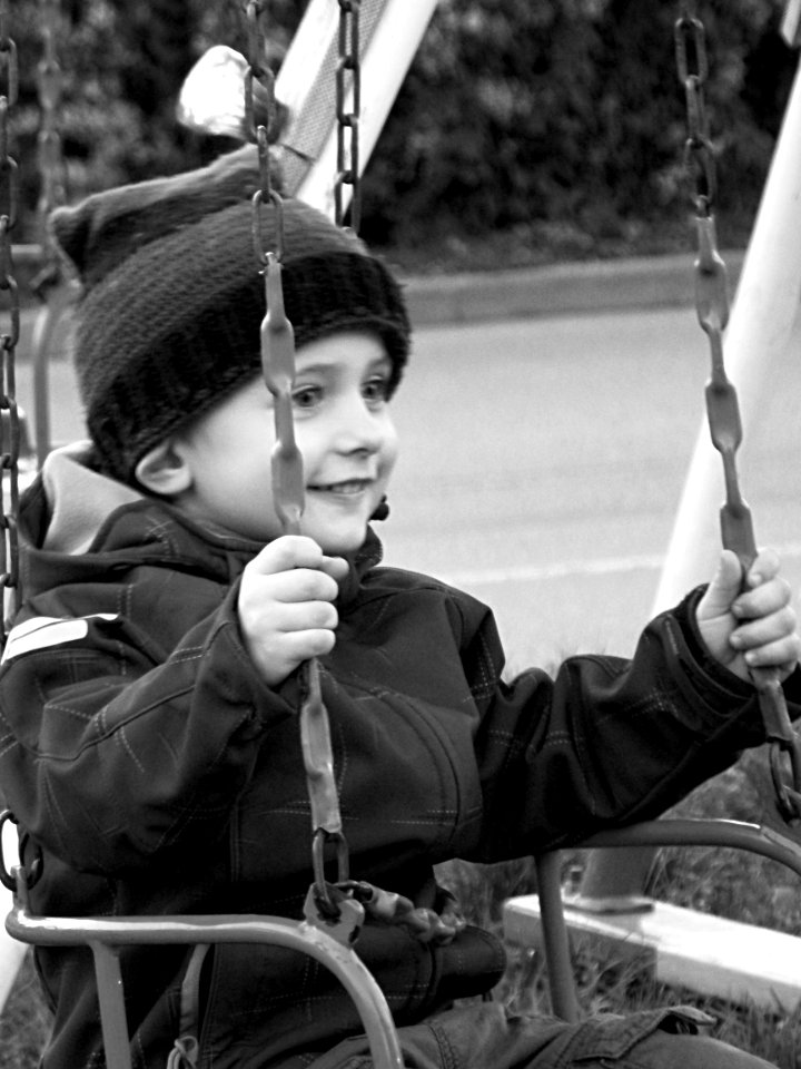 Happy Boy on Carousel  B&W