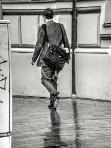 Man Walking in the Rain (HDR monochrome) photo