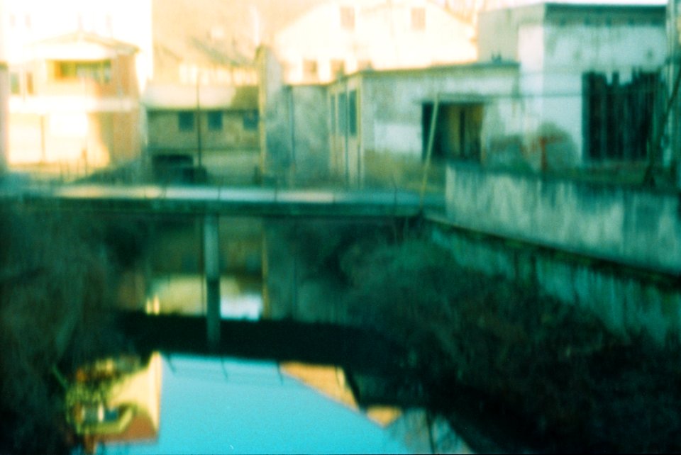 Canon Rebel XS + Pinhole Lens Body Cap - Reflection of Abandoned Place