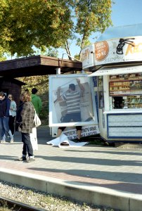 Canon EOS30 - New Scan - Man Replacing an Ad