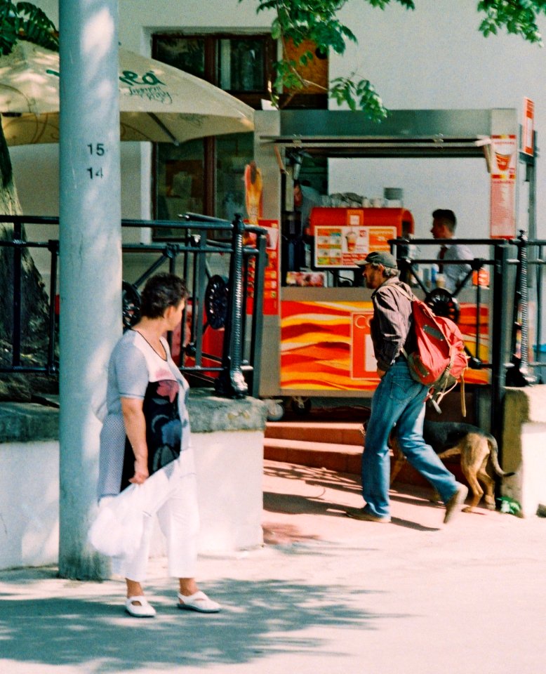 Woman Looking at Man Entering the Restaurant (Kiev camera)