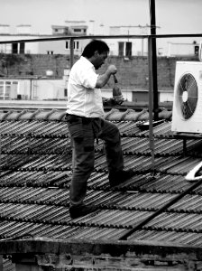 Workers on the Roof 03 photo