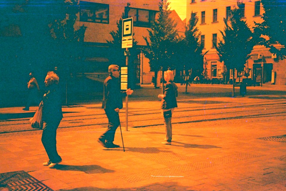 Pentacon Electra + redscale film - Tram Stop Scene 2