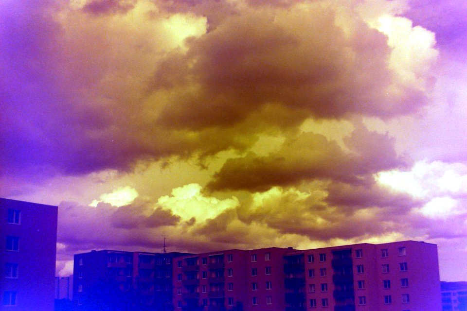 Redscale - Clouds above Housing Estate