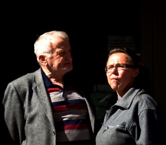 Elderly Couple at Tram Stop photo