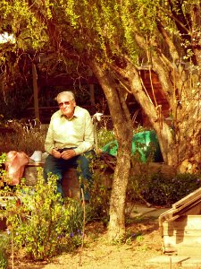 Man resting at his Little Garden photo