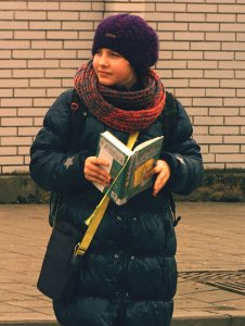 Reading Girl at Tram Stop 3