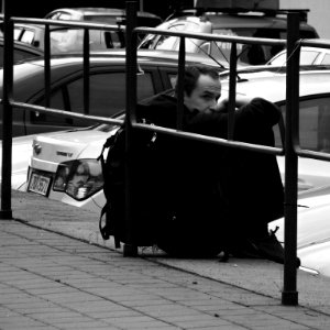Men Framed by the Railing