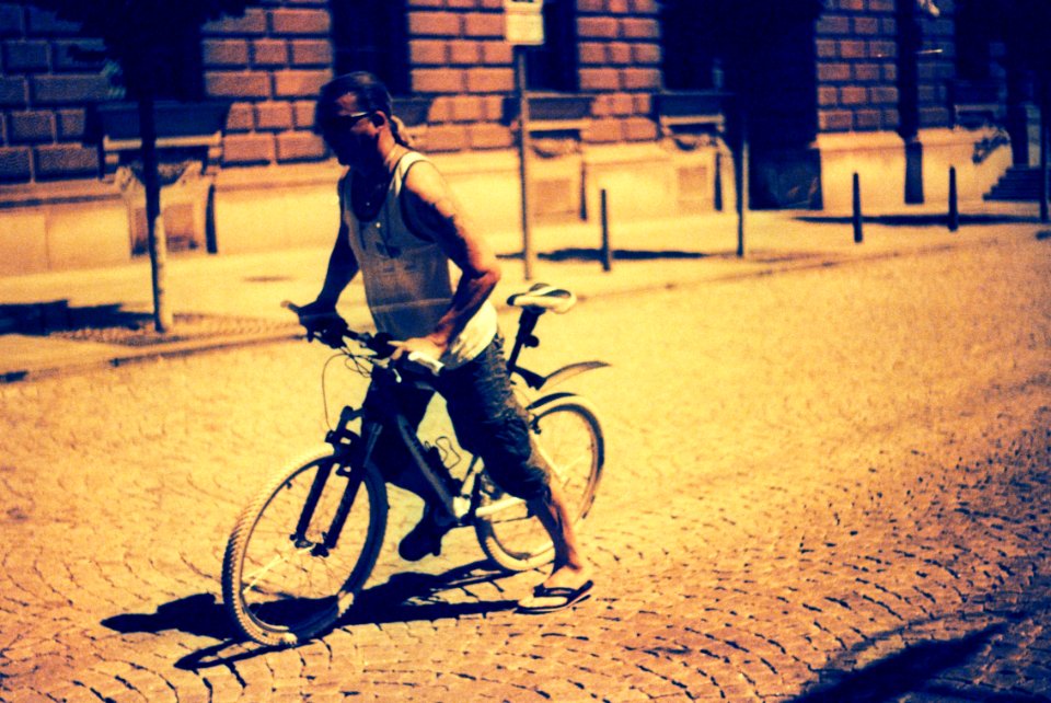 Praktica BC1 - Redscaled and Cross Processed - Cyclist on Joštova Street 1