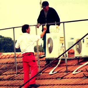 Workers on the Roof 06 photo