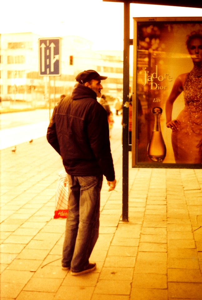 Praktica BC1 - Redscale - Man Looking at Ad