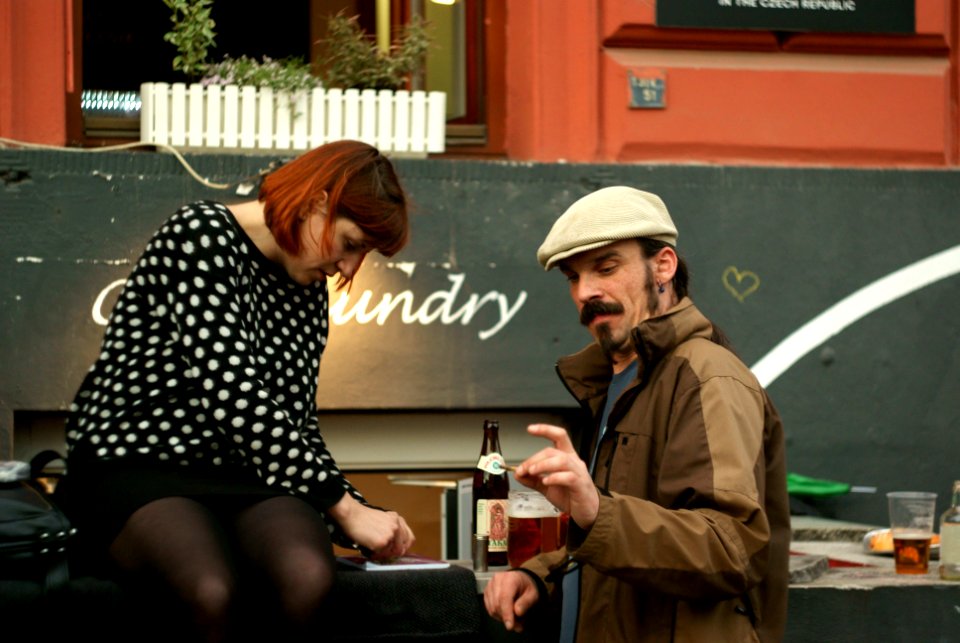 Sony Alpha A230 with Helios-44-2 - Couple in front of Café Laundry