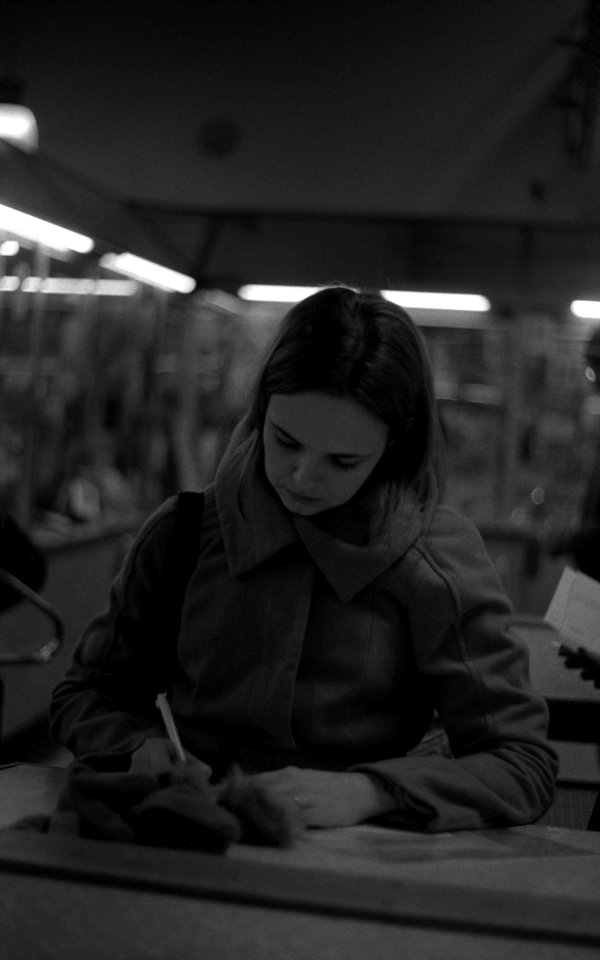 Praktica BC1 - Woman Writing an Adress at Post Office