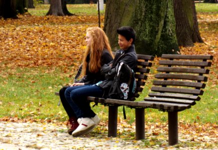 Candid Young Couple in the Park photo