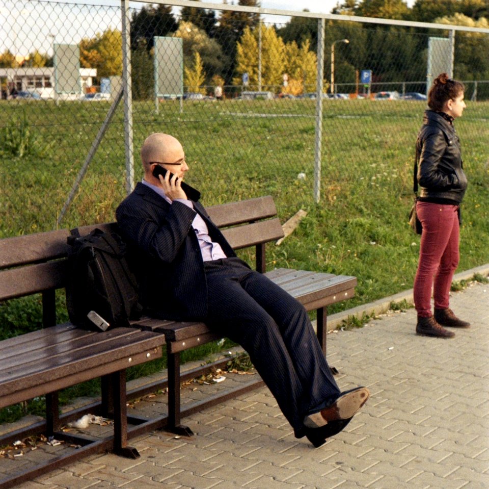 Kiev 4 - New Scan - Businessman Making a Phone Call an Looking at a Girl (square version)