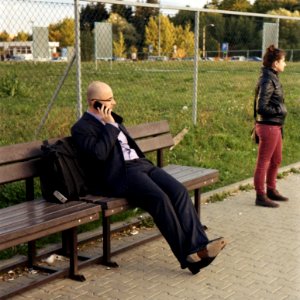 Kiev 4 - New Scan - Businessman Making a Phone Call an Looking at a Girl (square version)