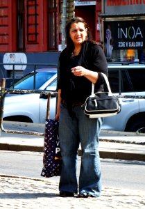 Another Woman with a Cigarette at Tram Stop photo