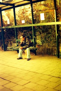 Praktica BC1 - Redscale - Man at the Bus Stop