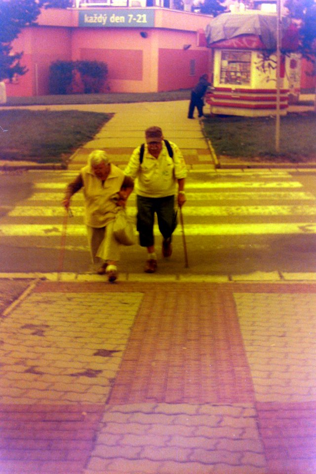 Redscale - Elderly Couple on Crosswalk