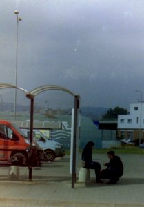 Praktica - Couple at Bus Stop photo