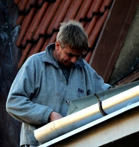 Worker on the Roof photo
