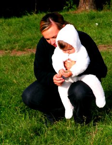 Young Mother with Teletubbie Like Child