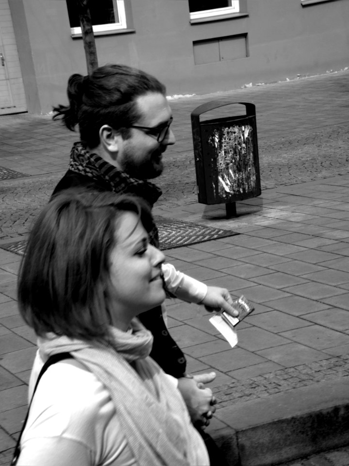 Couple Catching the Tram Where I'm Sitting B&W