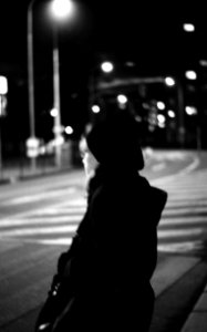 Praktica BC1 - Woman at Night Crosswalk photo
