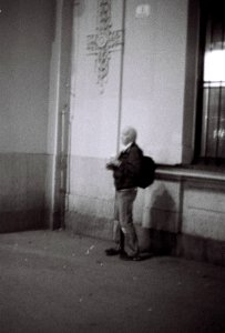 Canon EOS30 - Man in front of Railway Station photo