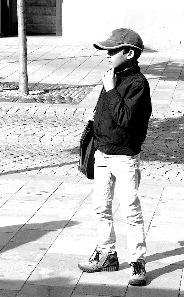 Boy at the Tram Stop