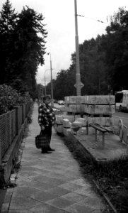 Smena Symbol - Woman on Sidewalk