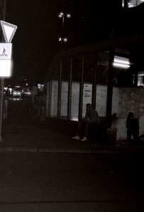 Canon EOS30 - Man Sitting in front of Underpass photo