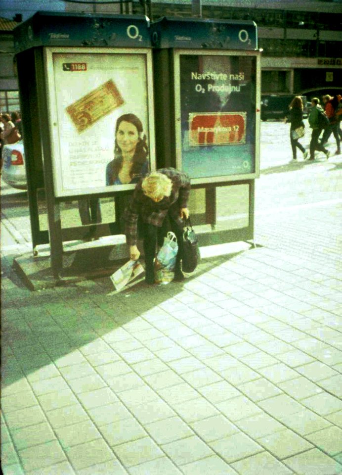 Chaika 3 - Woman Picking-up a Newspaper