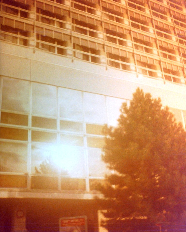 Chaika 3 (on redscale film) - Reflection on Hospital Bohunice Building