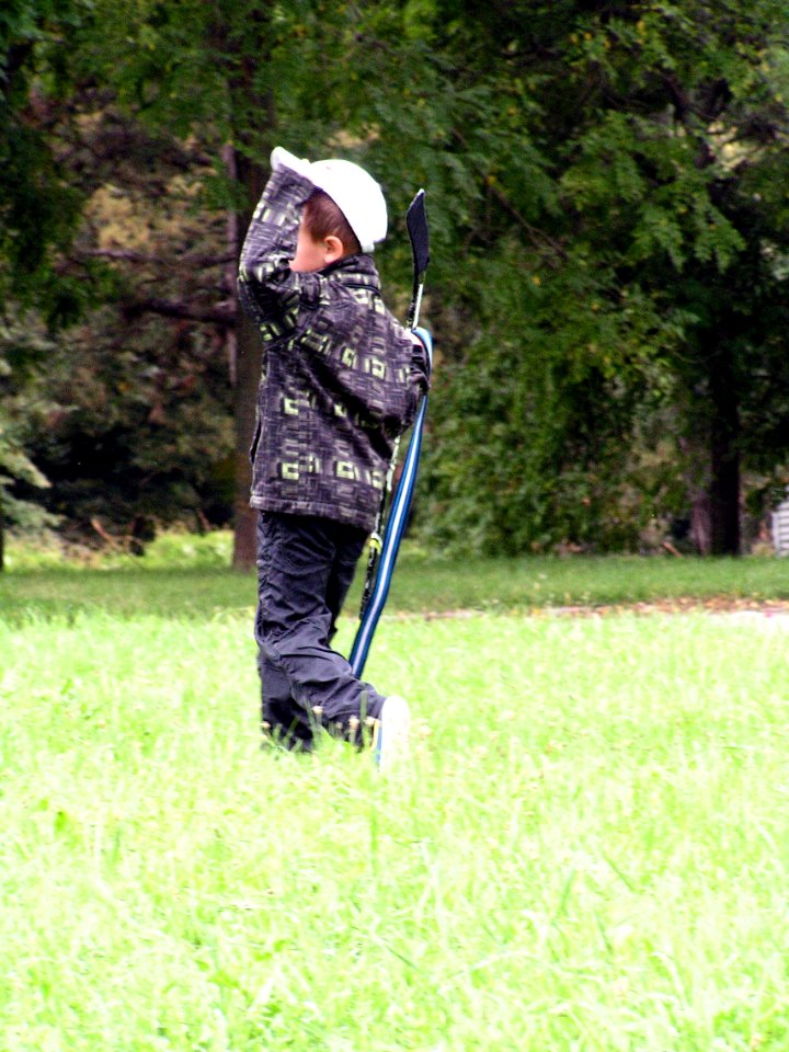 Running Boy with Hockey Stick