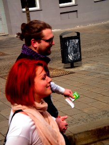 Couple Catching the Tram Where I'm Sitting photo