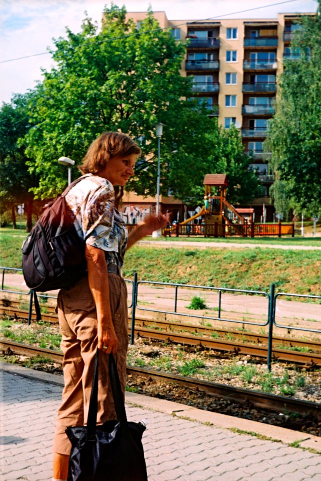Vega II - Woman at Tram Stop