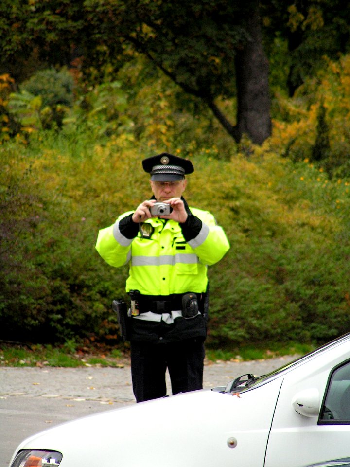 Policeman Taking a Shot