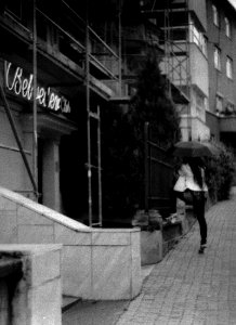 Praktica BC1 - Young Woman with a Phone and Umbrella