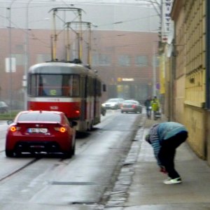 Man Fixing His Shoe