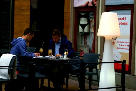 Sony Alpha A230 with Helios-44-2 - Men Working in a Café