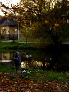Fisherman at the Svitava River Bank