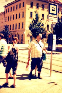 Praktica BC1 - Redscaled and Cross Processed - Blind man at Tram Stop photo