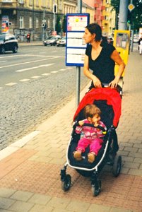 Elikon 35S - Mother at Bus Stop Looking at Something photo